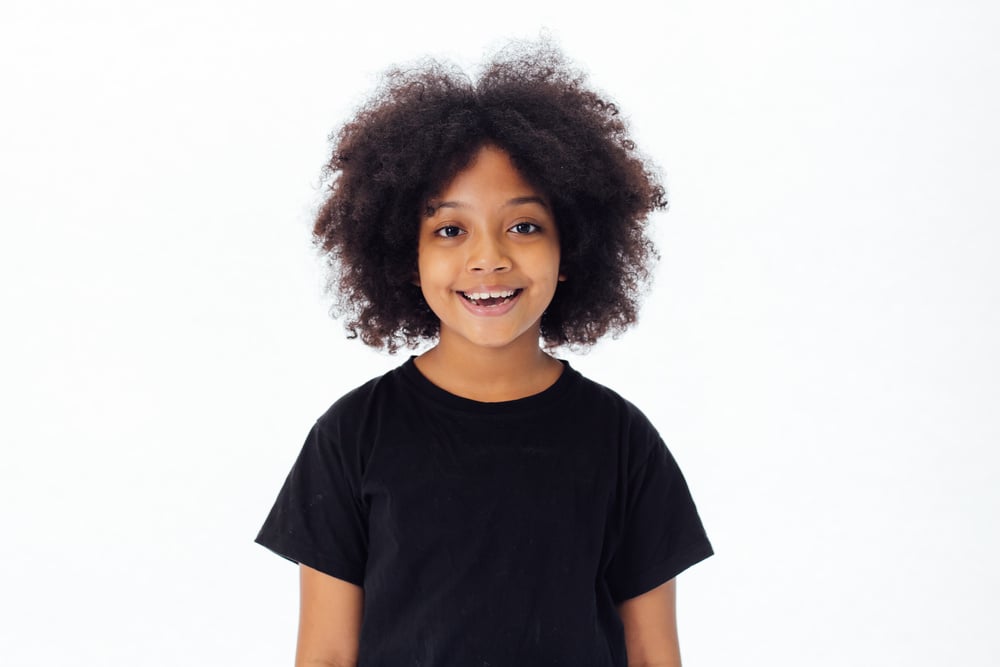 Cute and Happy African American Kid Smiling and Laughing Isolate